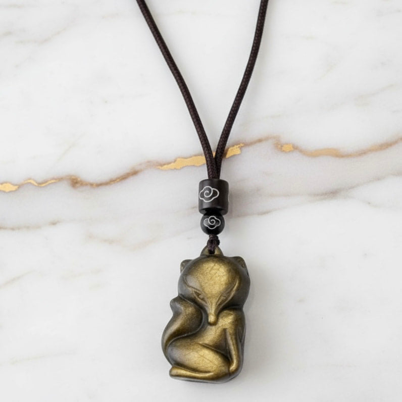 Gold Obsidian Anhänger - Schimmernder Begleiter CrystalScents