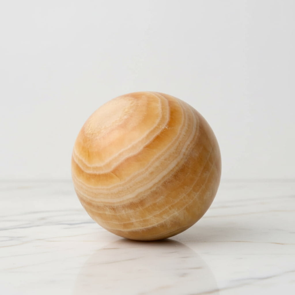 Calcit Kugel – Wärme & Lebensfreude