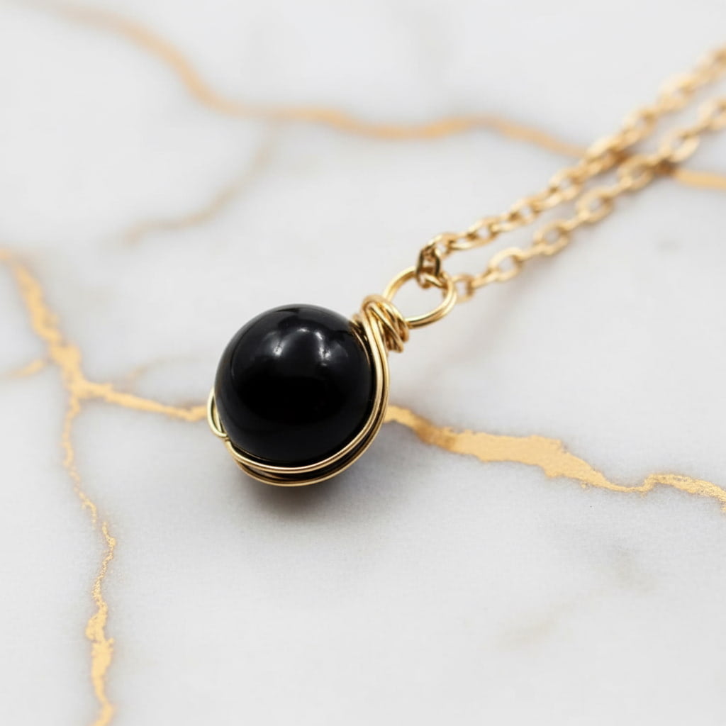 Achat Halskette – Schwarze Kugel an goldener Kette CrystalScents