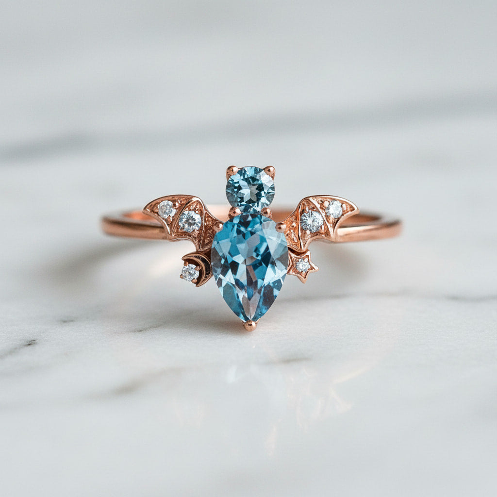 Ring mit funkelnder blauer „Fledermaus“ CrystalScents