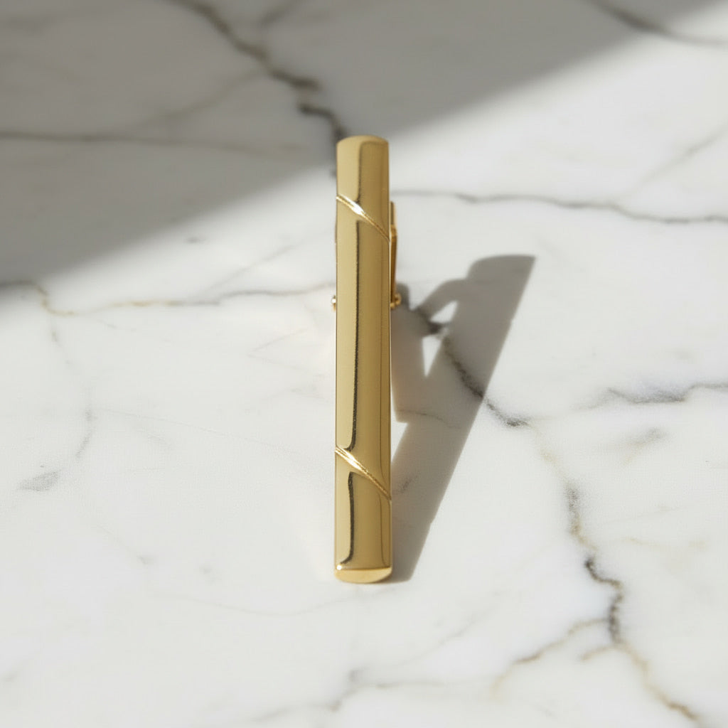 Krawattenklammer in glänzendem Gold CrystalScents