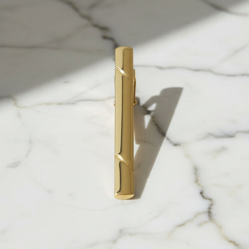 Krawattenklammer in glänzendem Gold CrystalScents