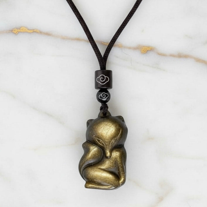 Gold Obsidian Anhänger - Schimmernder Begleiter CrystalScents