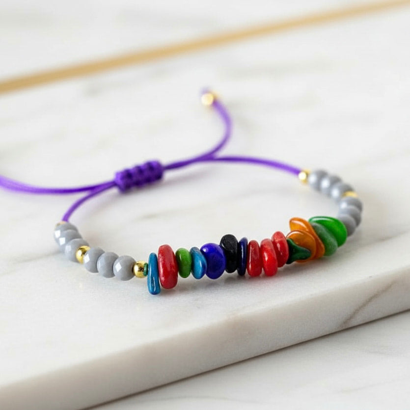 Schutzarmband mit bunten Muschelschalen