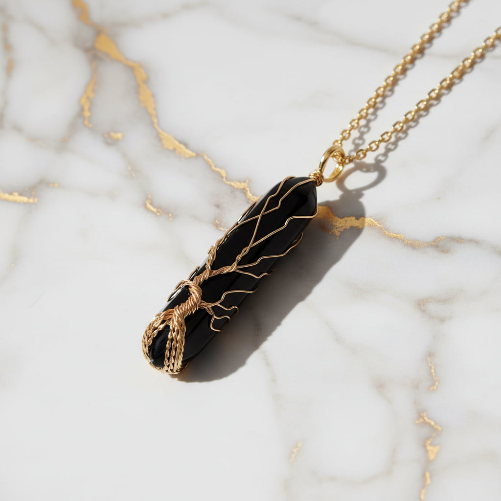 Obsidian Halskette - Goldverzierter Doppelender CrystalScents