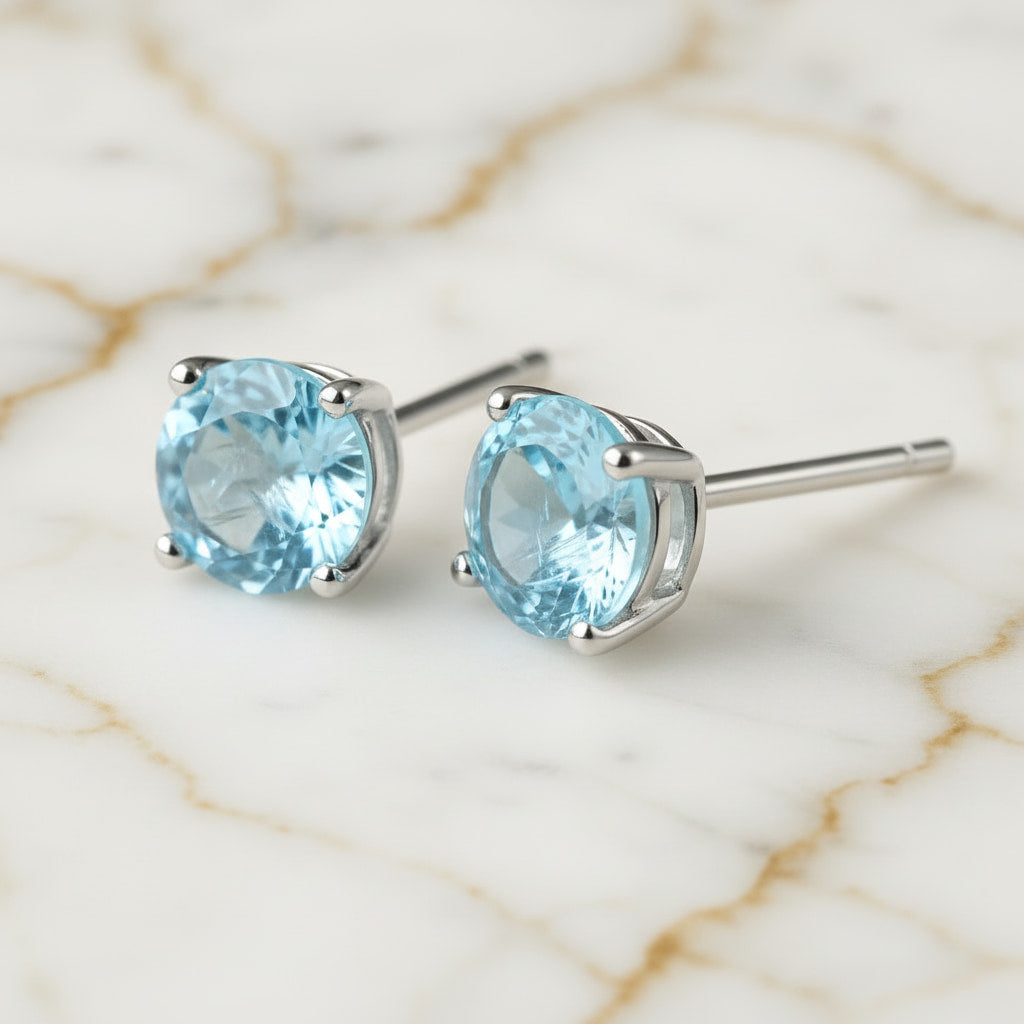 Topas Ohrringe – Feiner Glanz in kühlem Blau
