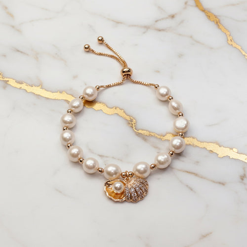 Perlenarmband – Schmuckstück mit Muschelanhänger CrystalScents
