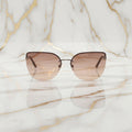 Sonnenbrille – Auffällig braunes Cateye CrystalScents