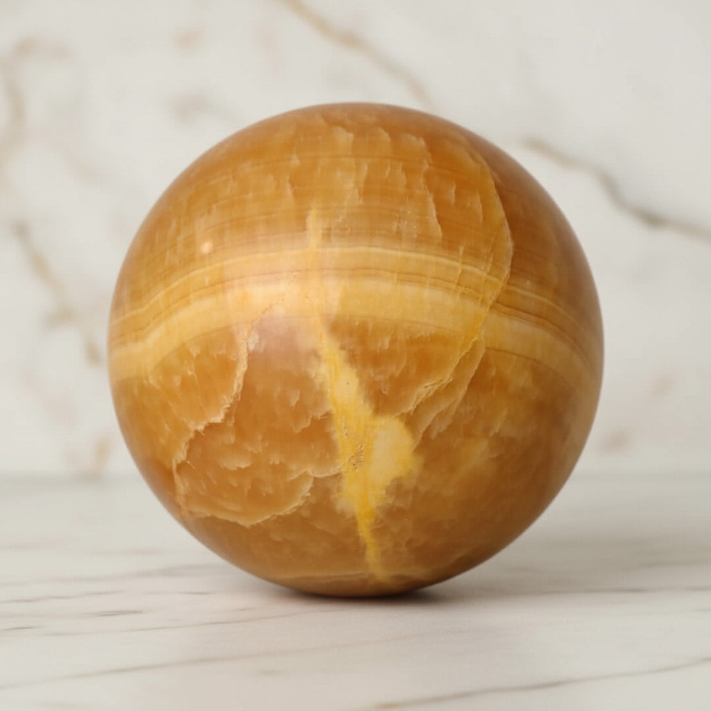 Große Calcit Kugel - in kräftigem Orange CrystalScents