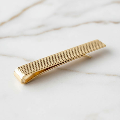 Krawattenklammer Wellenform gemustert in warmem Goldton CrystalScents