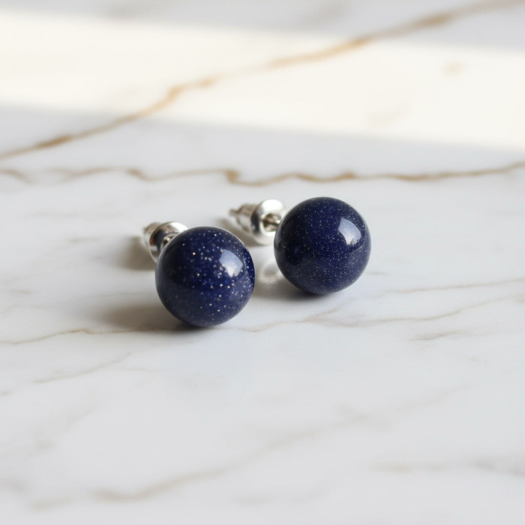 Ohrringe mit funkelnden Blaufluss Kugeln