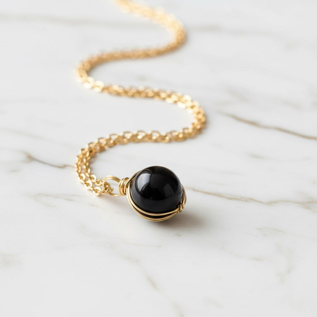 Achat Halskette – Schwarze Kugel an goldener Kette CrystalScents