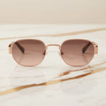 Sonnenbrille – Breit in Roségold für modernen Look CrystalScents