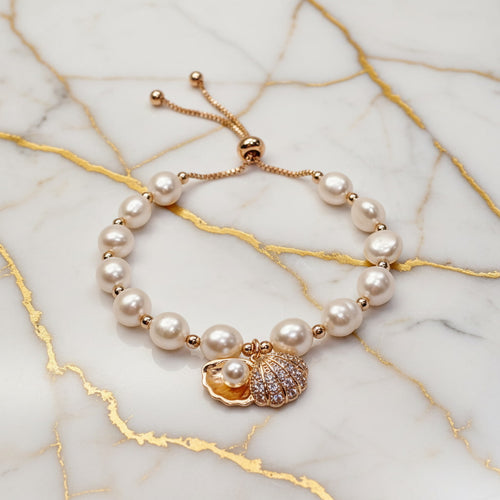 Perlenarmband – Schmuckstück mit Muschelanhänger CrystalScents