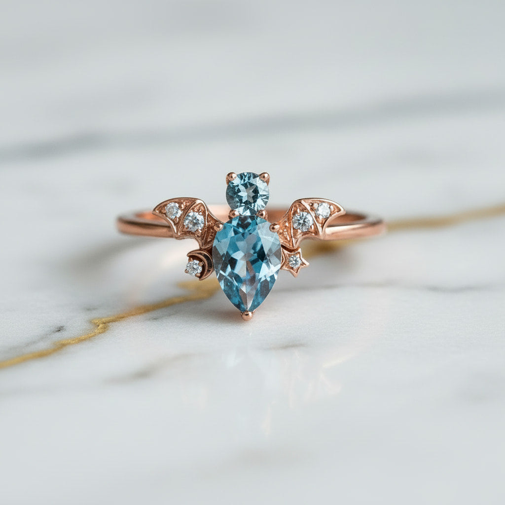 Ring mit funkelnder blauer „Fledermaus“ CrystalScents