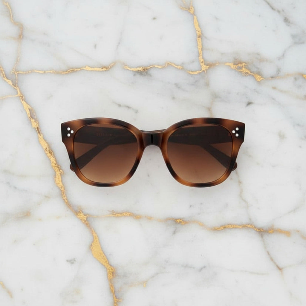 Sonnenbrille - in geflecktem Design CrystalScents