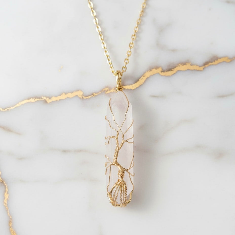 Bergkristall Halskette - Goldverzierter Doppelender