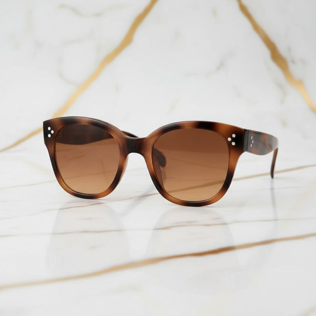 Sonnenbrille - in geflecktem Design CrystalScents