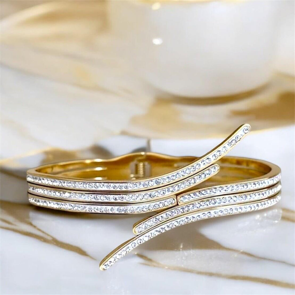 Offenes geschwungenes Armband Gold – Eleganter Schwung für stilvolle Akzente