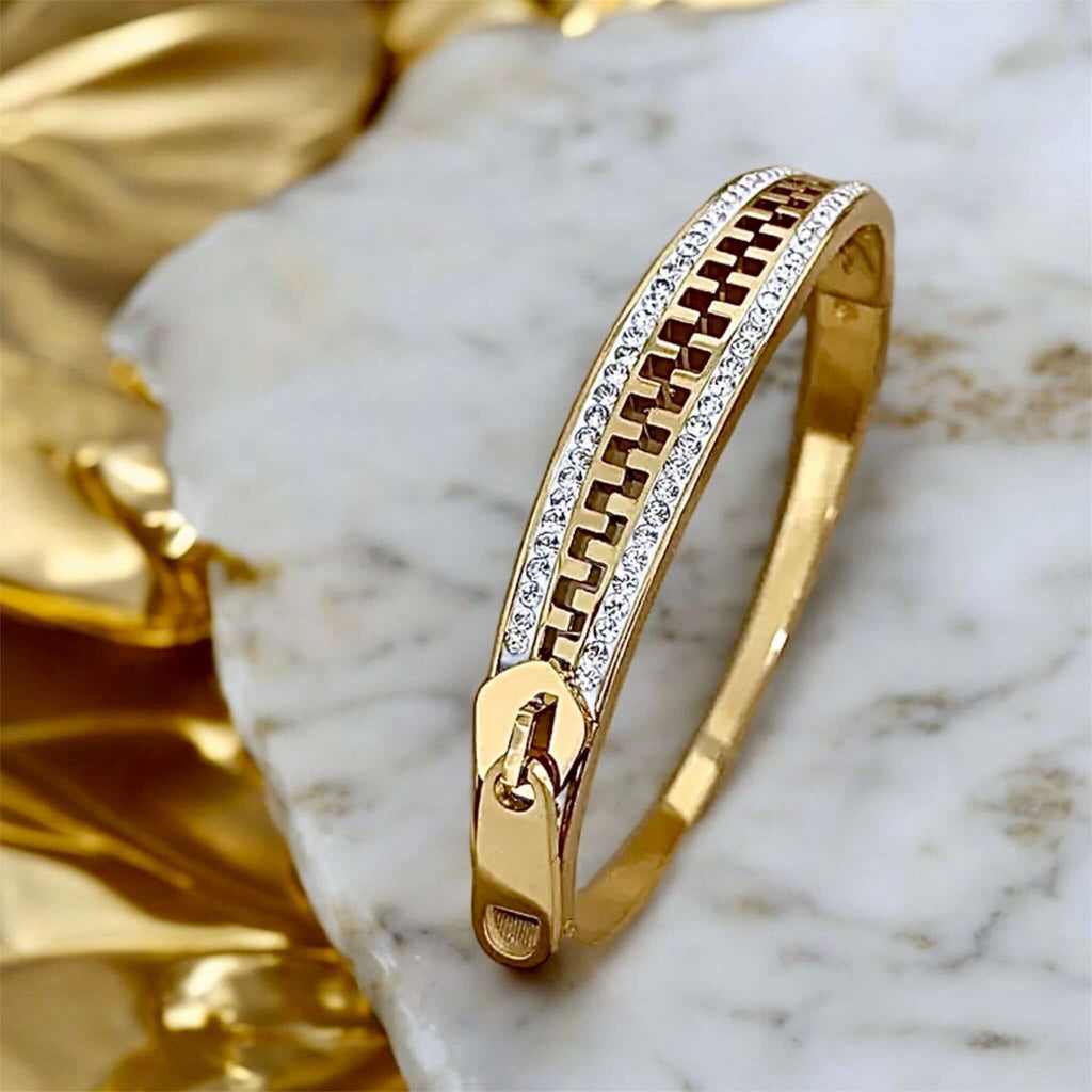 Armband in Gold mit funkelndem „Reißverschluss“ – Ausdrucksstarkes Accessoire für besonderen Glanz