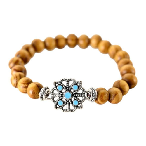 Elastisches Armband mit hellen Holzperlen und Blumenelement