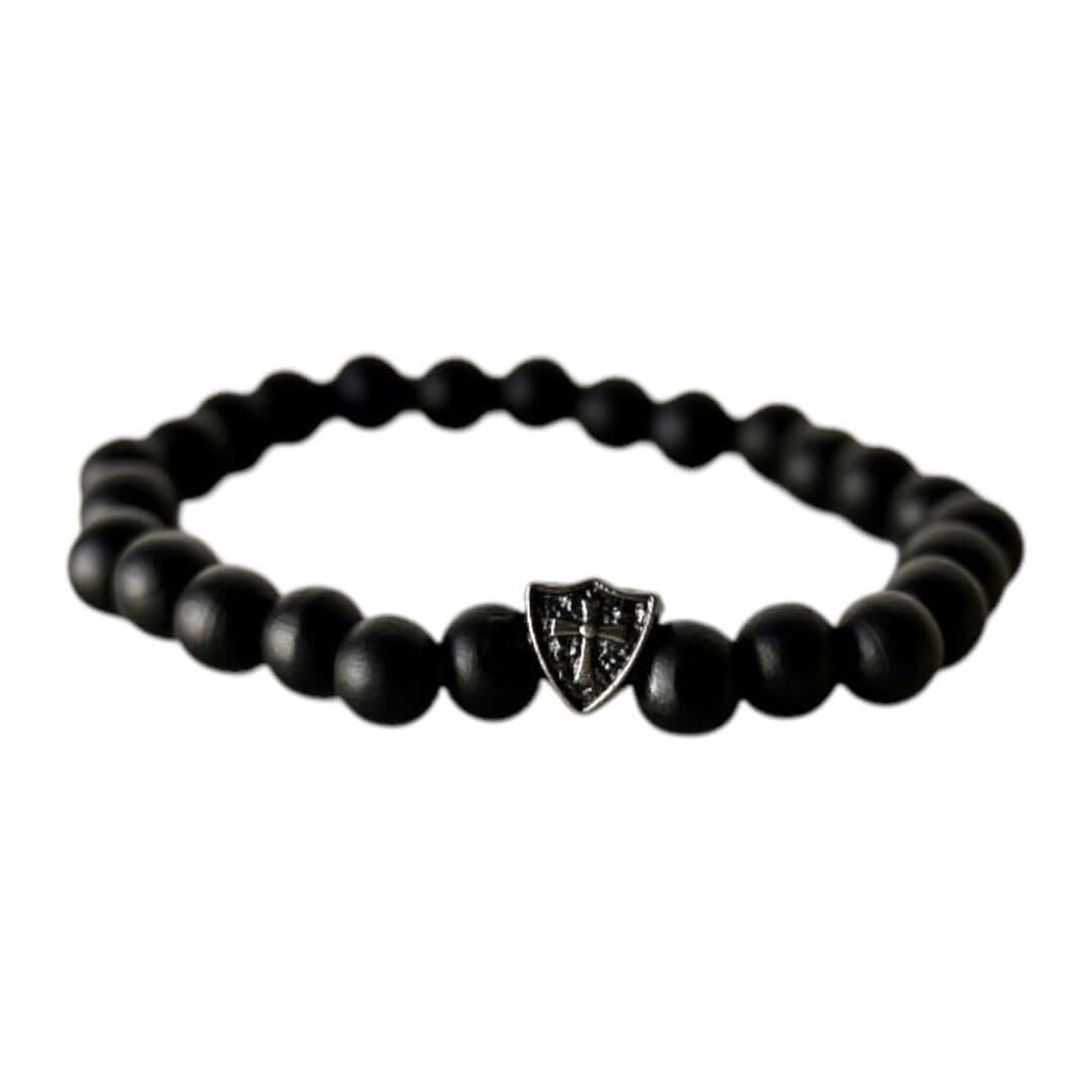 Elastisches Armband mit schwarzen Holzperlen und Schildelement