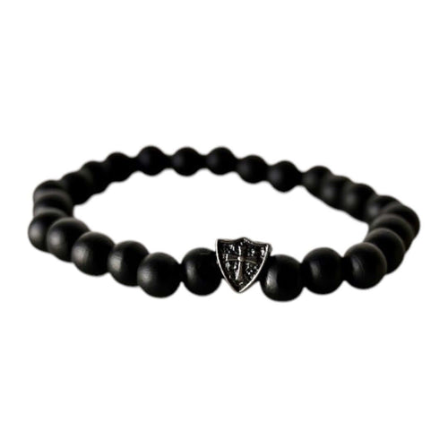 Elastisches Armband mit schwarzen Holzperlen und Schildelement