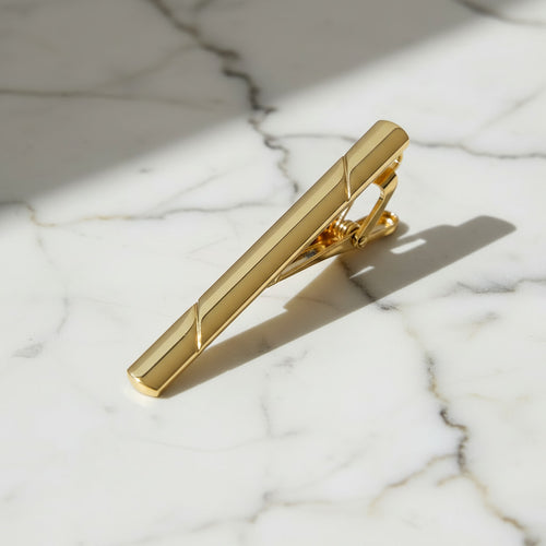 Krawattenklammer in glänzendem Gold CrystalScents