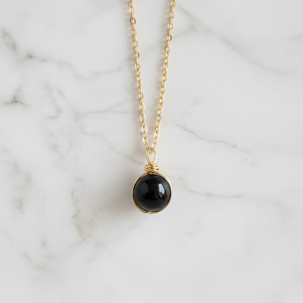 Achat Halskette – Schwarze Kugel an goldener Kette CrystalScents