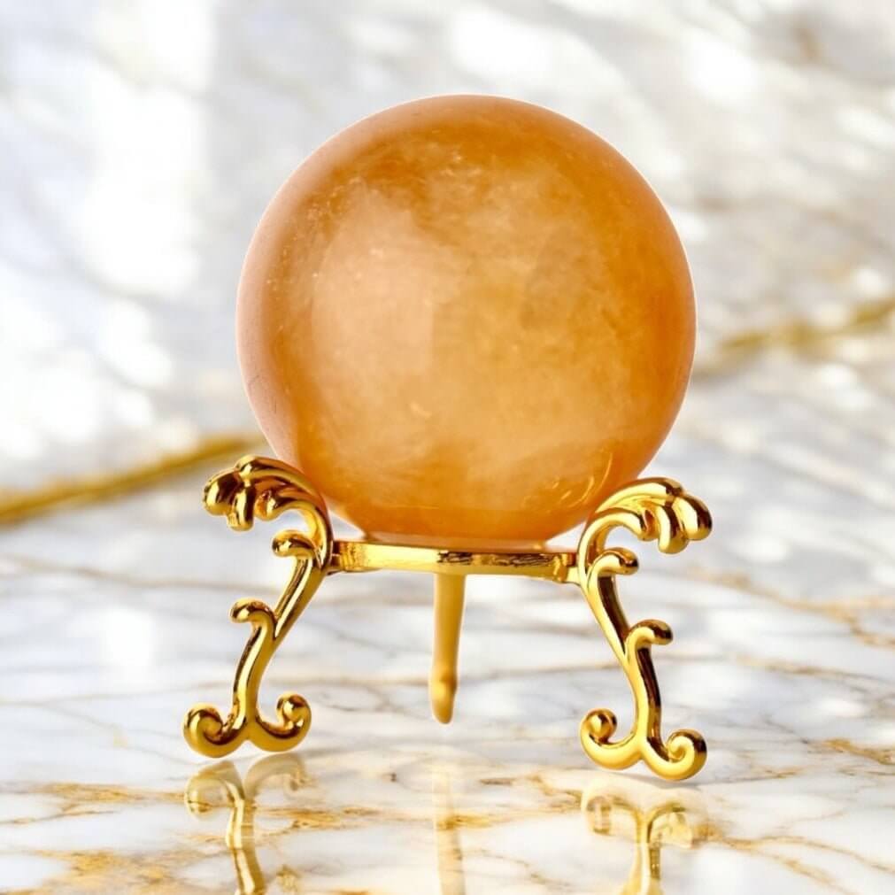 Kugel aus kräftig orangem Calcit – Stein für Energie und Vitalität
