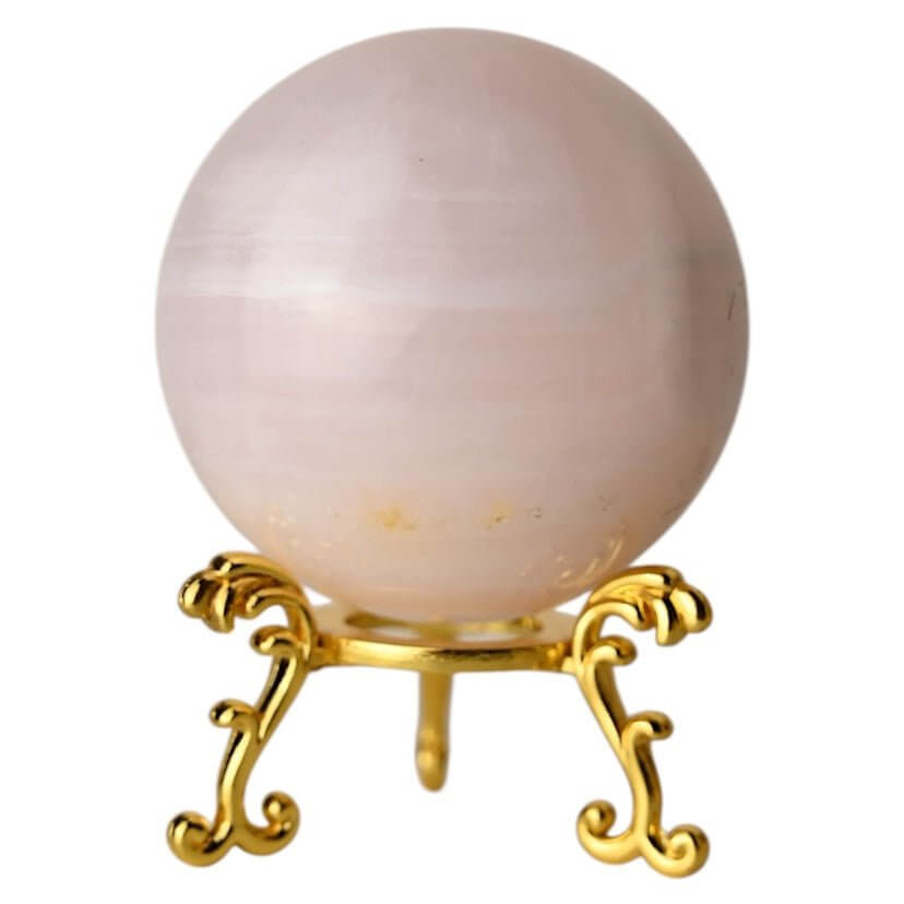 Sanft schimmernde Kugel aus rosa Calcit – Stein der Geborgenheit und inneren Balance