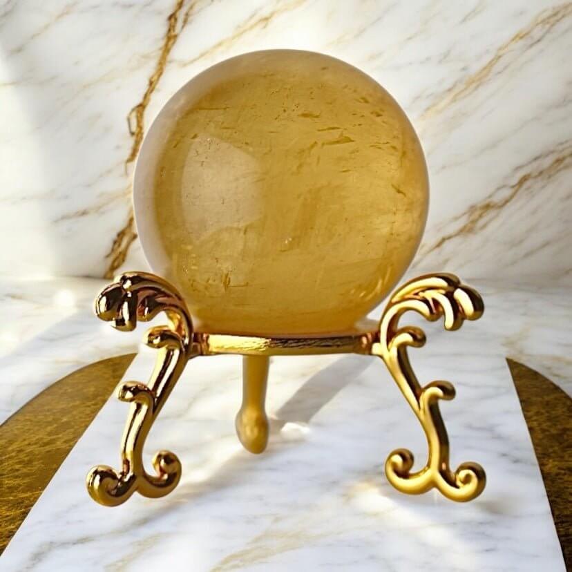 Strahlende Calcit Kugel in Orange – Symbol für Lebensfreude und Kreativität