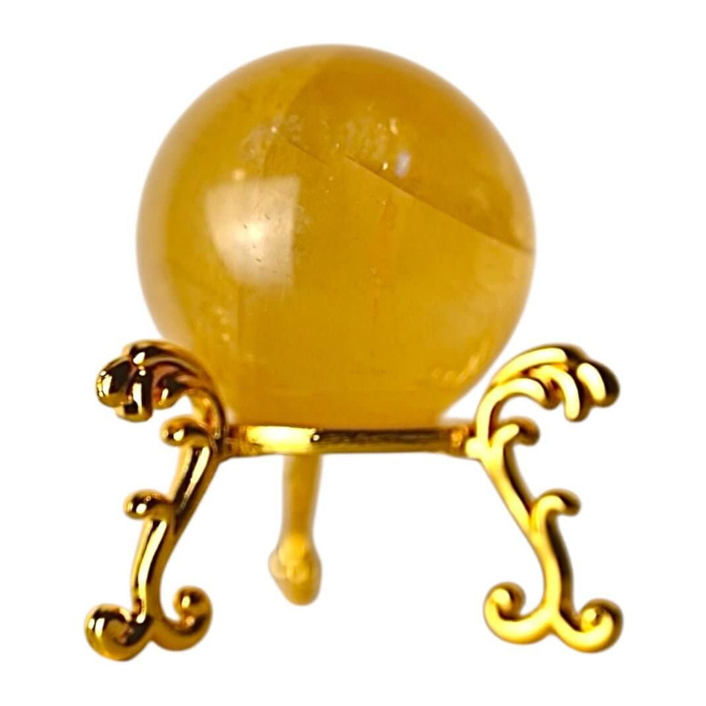 Strahlende Calcit Kugel in Orange – Symbol für Lebensfreude und Kreativität