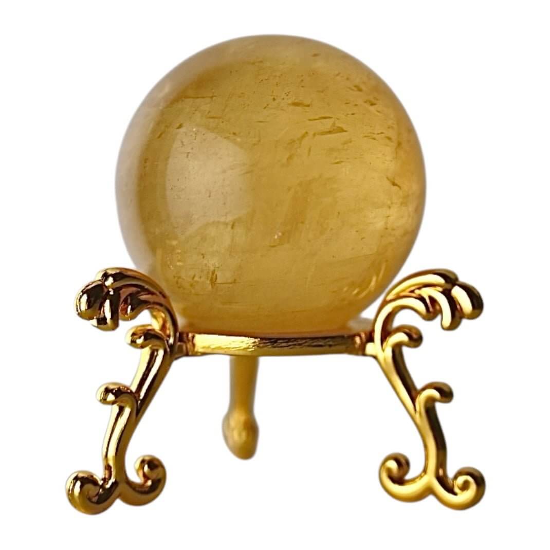 Strahlende Calcit Kugel in Orange – Symbol für Lebensfreude und Kreativität