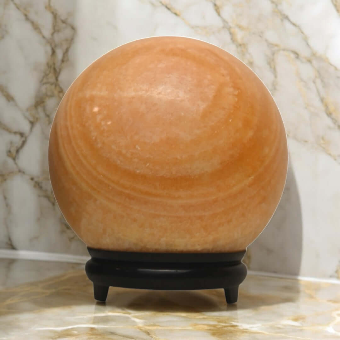 1 Große gestreifte Calcit Kugel in Orange