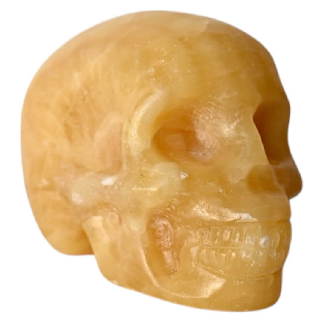 Oranger Calcit-Schädel – Kraftvolles Kristallobjekt für dekorative Akzente
