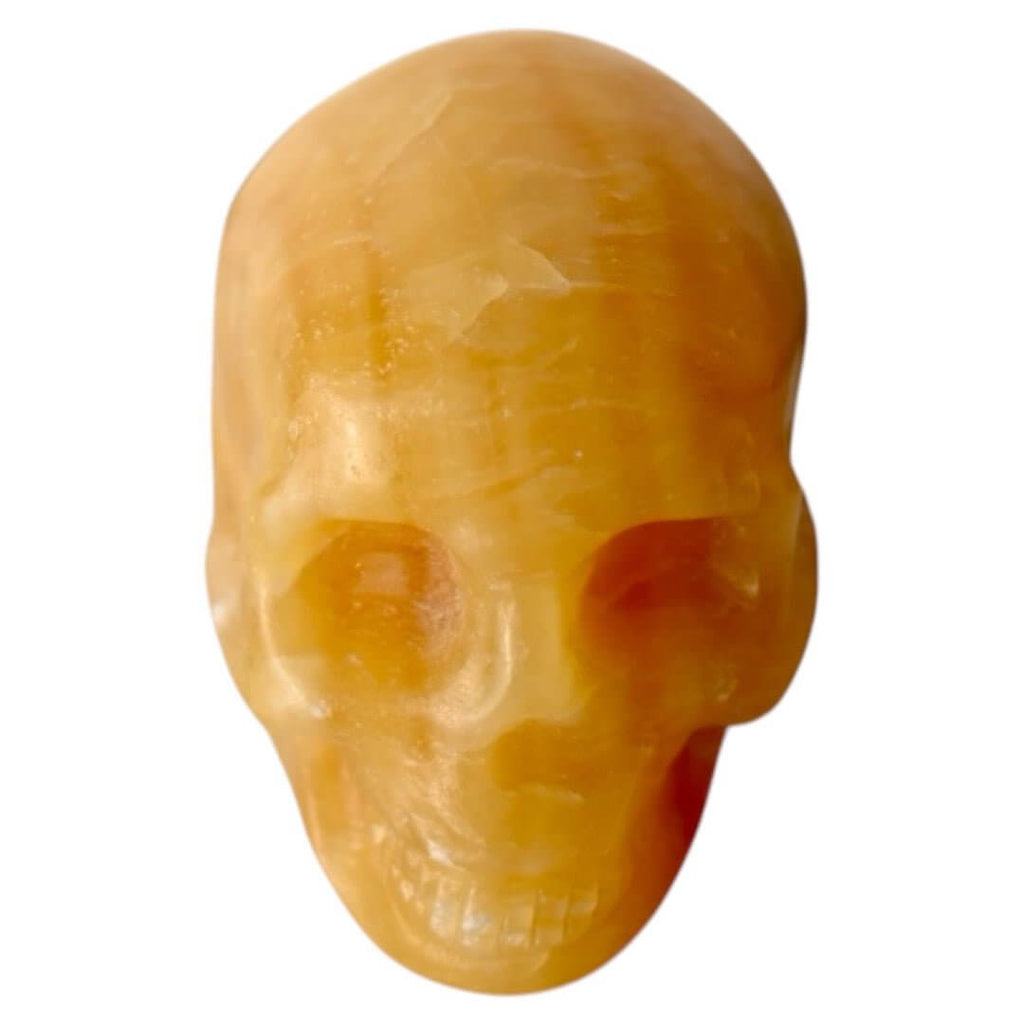 Oranger Calcit-Schädel – Kraftvolles Kristallobjekt für dekorative Akzente