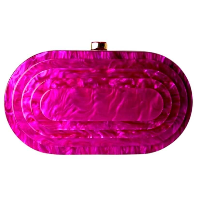 Pinke Perlmutt-Clutch – strahlender Farbakzent