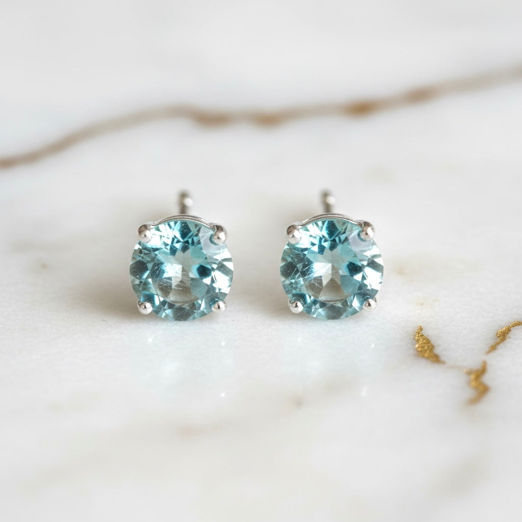 Topas Ohrringe – Feiner Glanz in kühlem Blau
