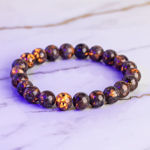 Flammenstein Yooperlite Kugelarmband – Mystisches Leuchten CrystalScents