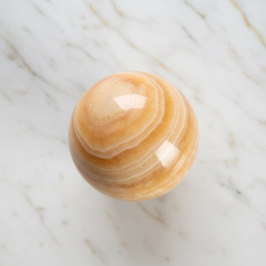 Calcit Kugel – Wärme & Lebensfreude