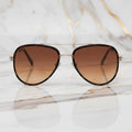 Sonnenbrille – Braun mit stylischem Steg CrystalScents