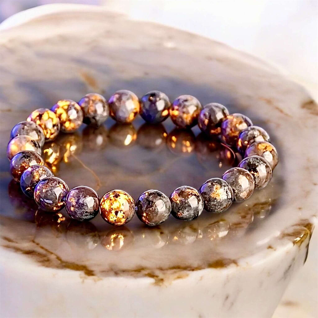 Flammenstein Kugelarmband – Mystische Tiefe mit feurigen Reflexen