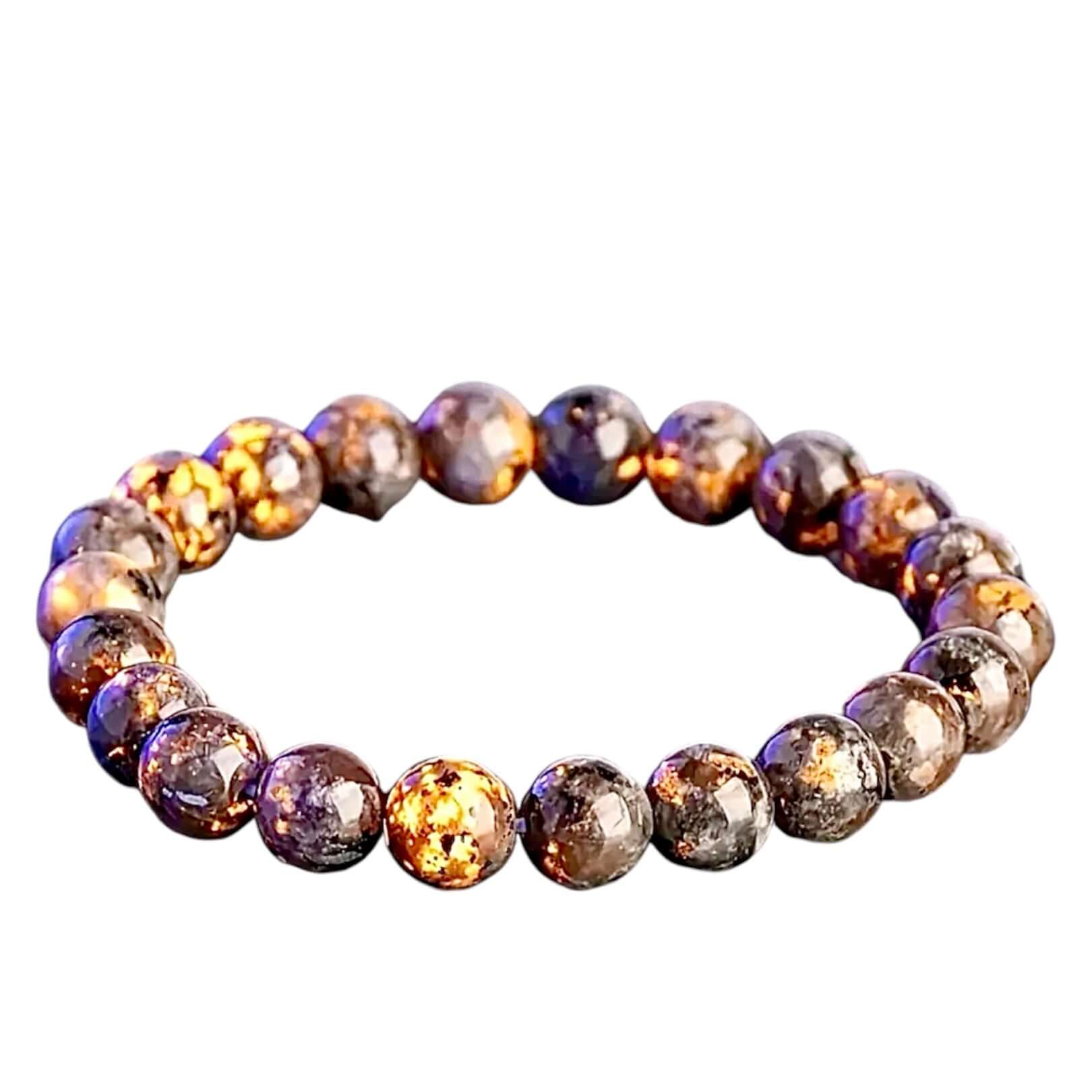 Flammenstein Kugelarmband – Mystische Tiefe mit feurigen Reflexen