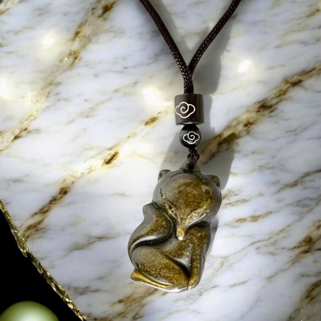 Halskette mit schimmerndem Gold Obsidian Anhänger