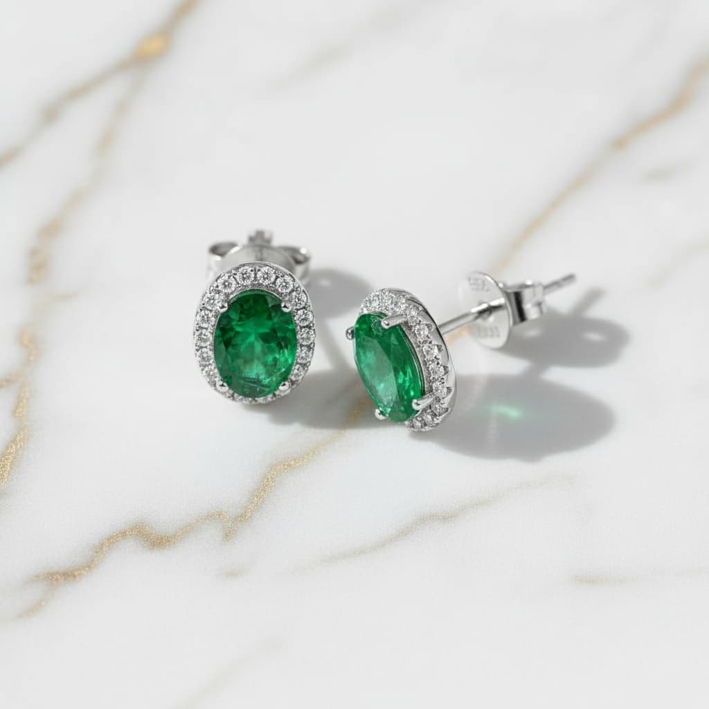 Ovale Smaragd Ohrringe in Silber