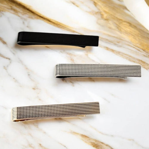 Krawattenklammer Wellenform gemustert in warmem Goldton