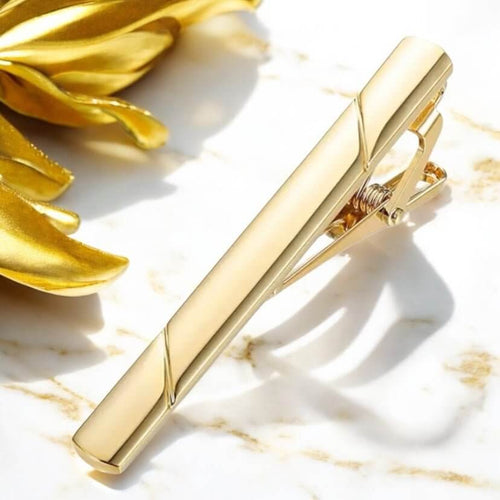 Minimalistische Krawattenklammer in glänzendem Gold