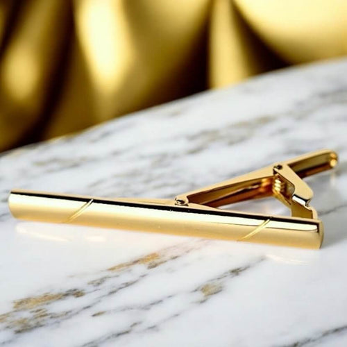Minimalistische Krawattenklammer in glänzendem Gold