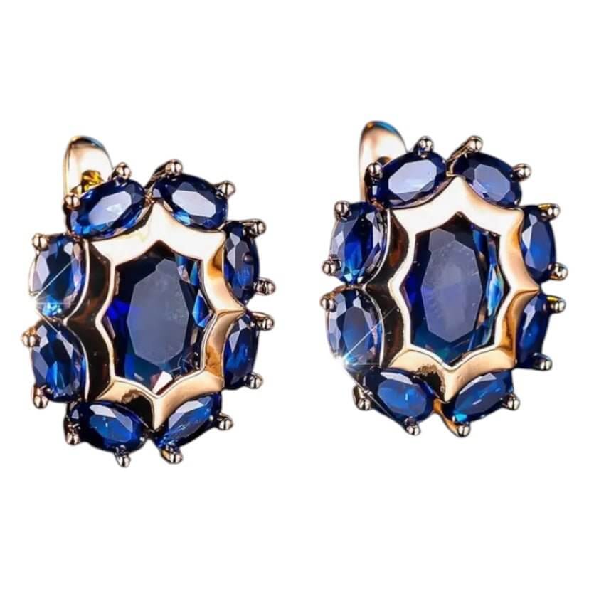 Goldene Kreolen mit blauem Akzent – elegantes Schmuckstück für leuchtende Akzente